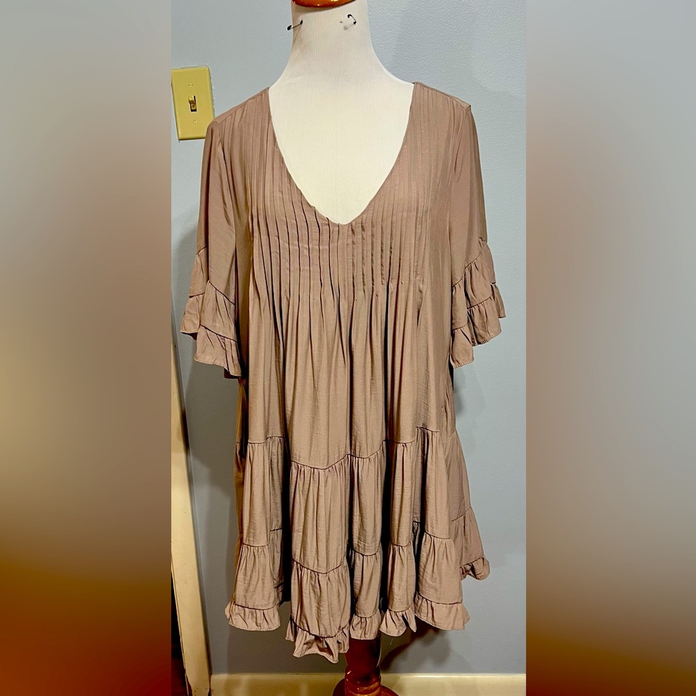 Super cute dress with romper liner underneath.